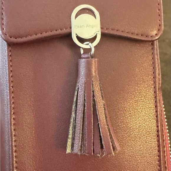 prarl angeli Handbags - Burgundy Faux Leather Tassel Wristlet/Crossbody purse.